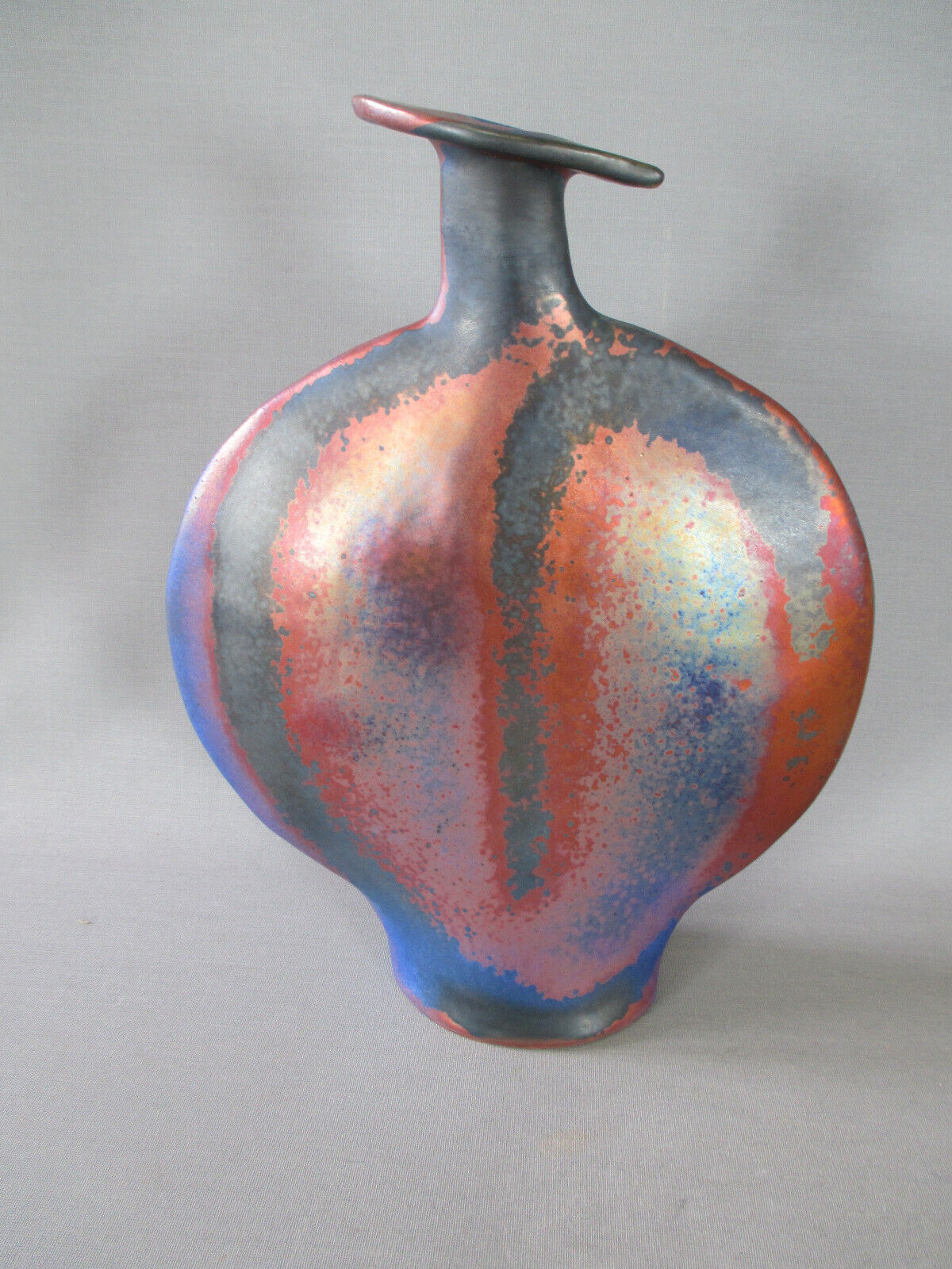 Lrge flat iridescent sandstone vase signed
