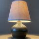 Small old enamelled sandstone lamp