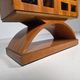 Mid-century modern mobile bar cabinet with sculptural base, 1950s.