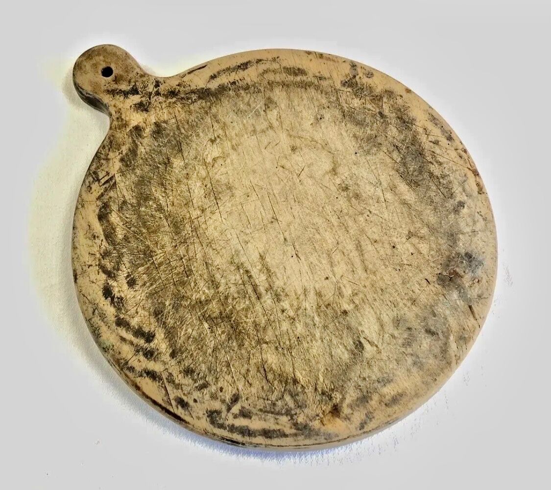Old large round pizza cutting board