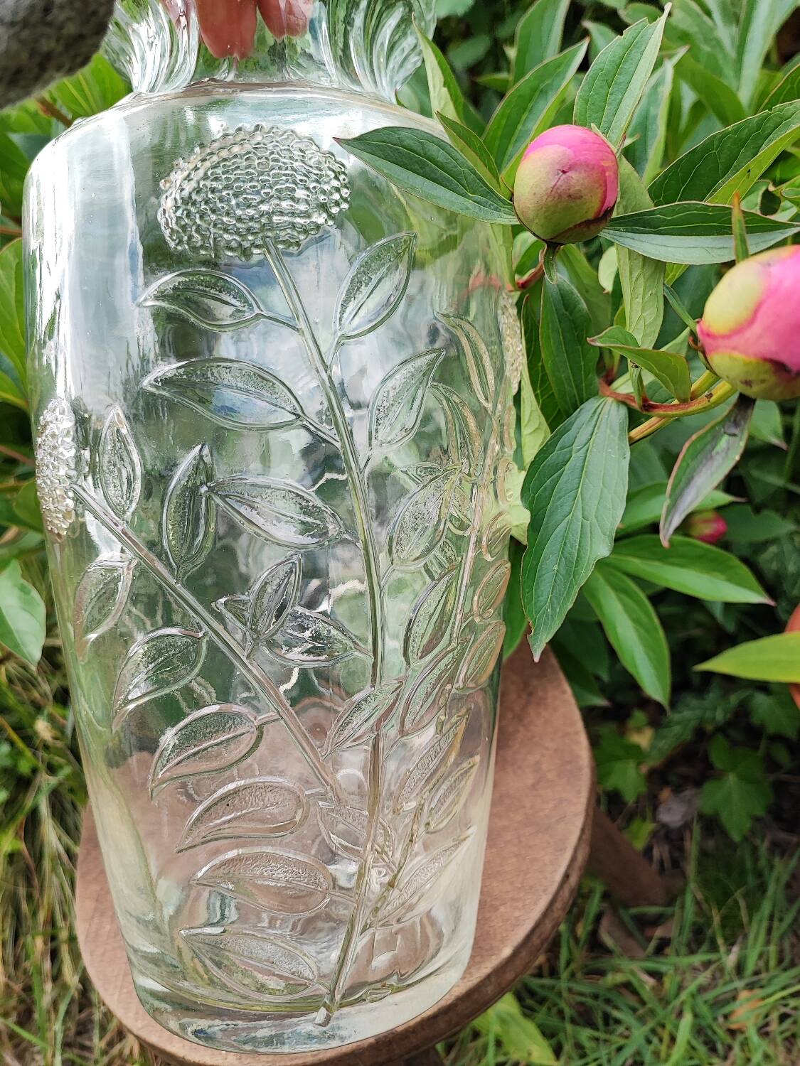 Old large molded glass vase with thistle decoration