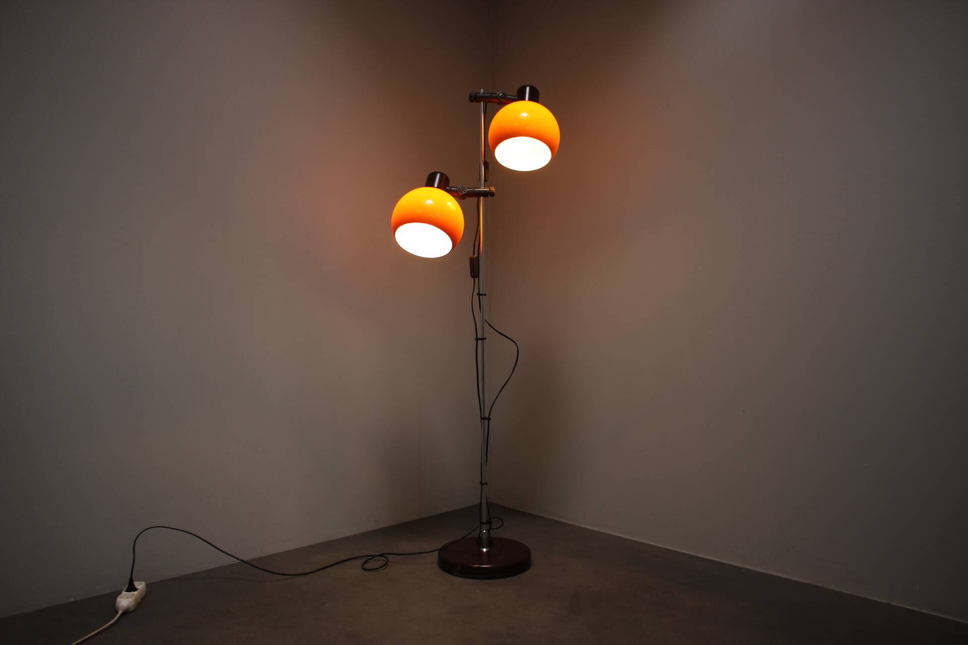 Vintage Hungarian adjustable floor lamp with two orange globe shades, circa 1970.