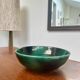 Green glazed ceramic bowl, signed Idlas.