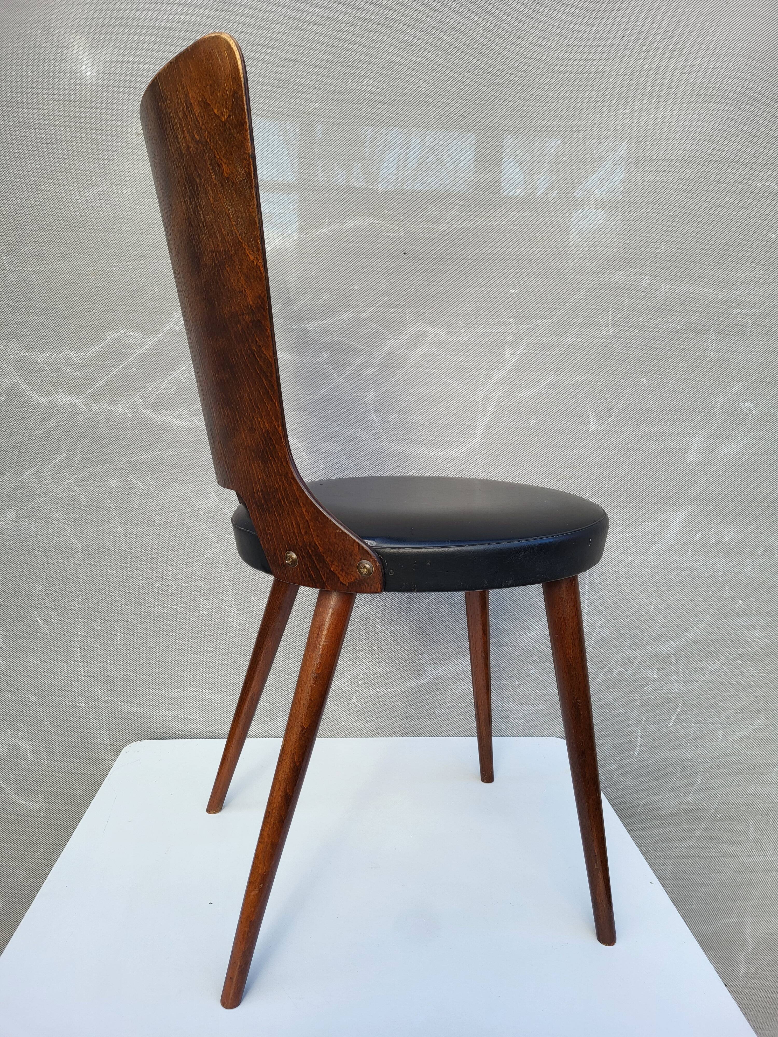 Pair of Dove chairs • Baumann • Black faux leather