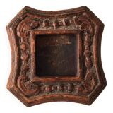Photo frame in worked wood.