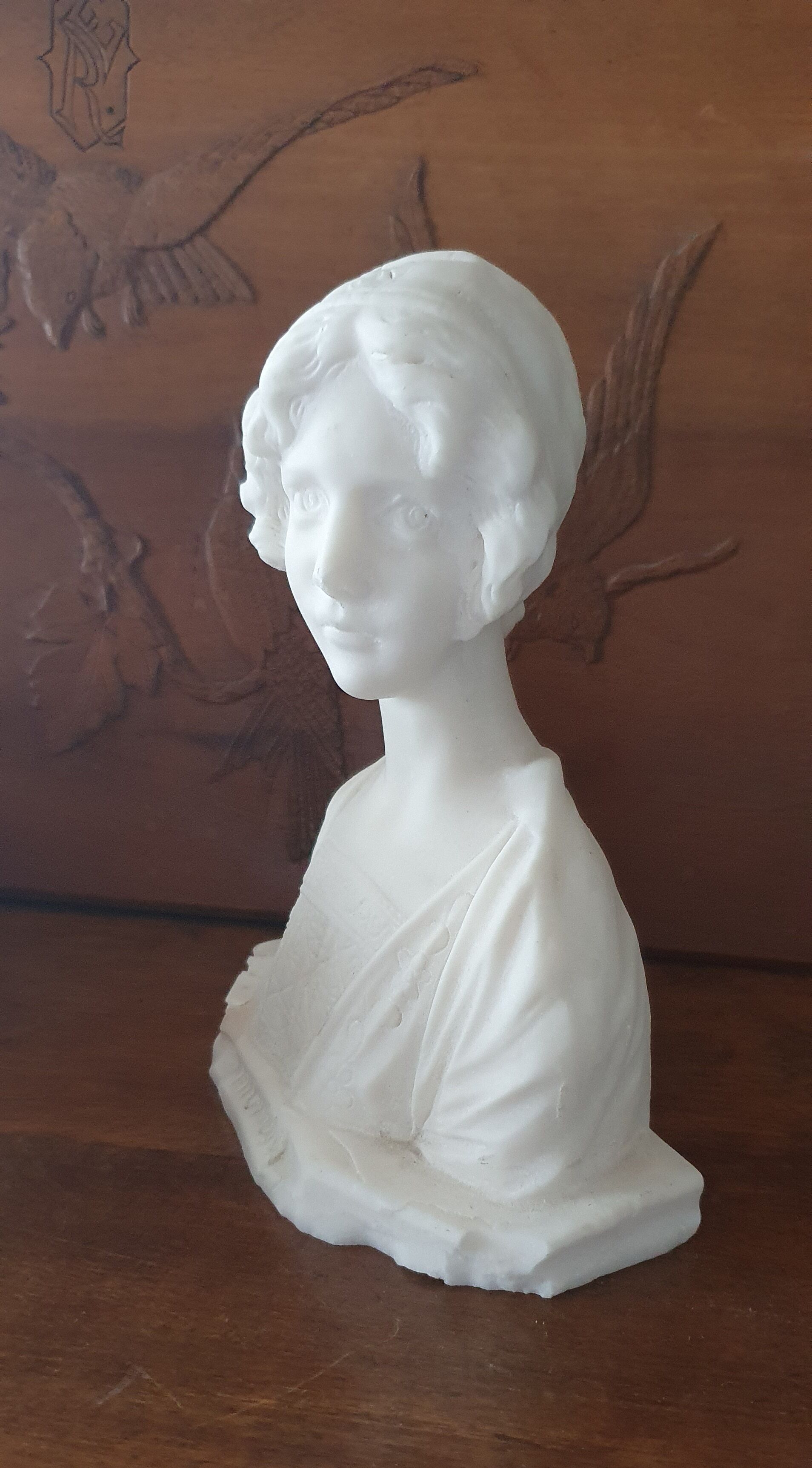 Bust of young woman L.Mignon