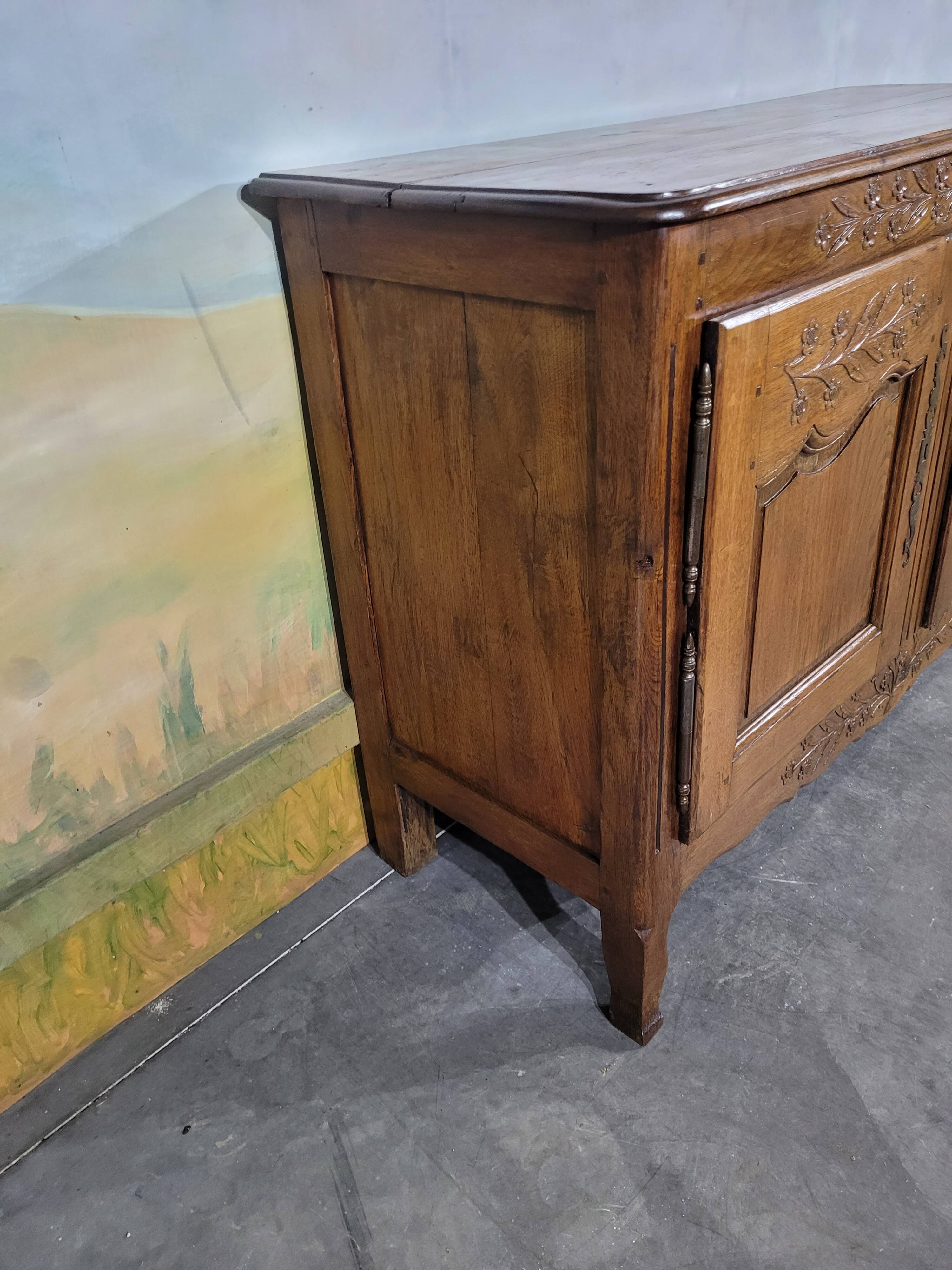 Low Norman sideboard carved in 19th century oak