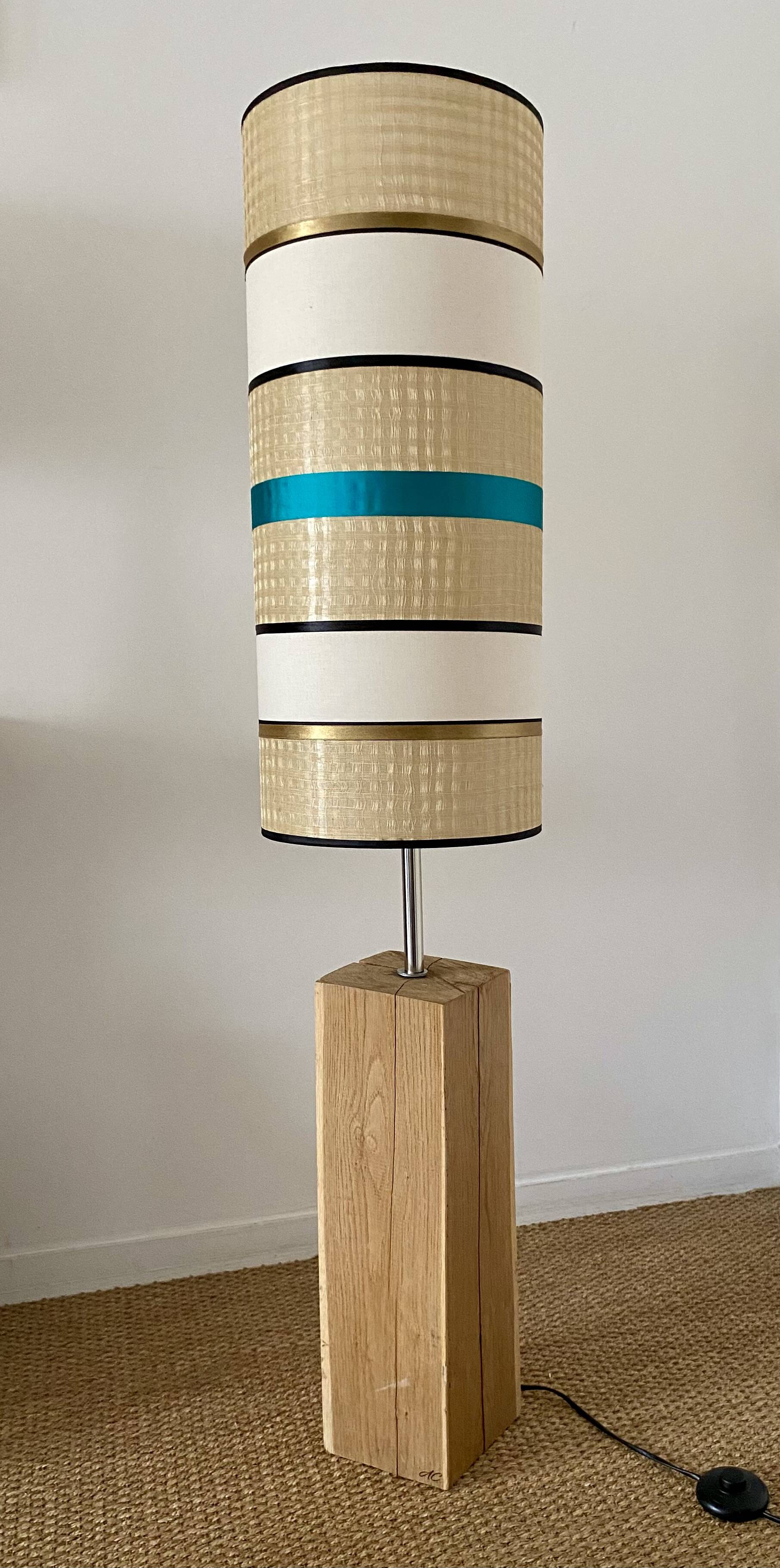 Solid oak floor lamp with a designer shade