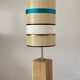 Solid oak floor lamp with a designer shade