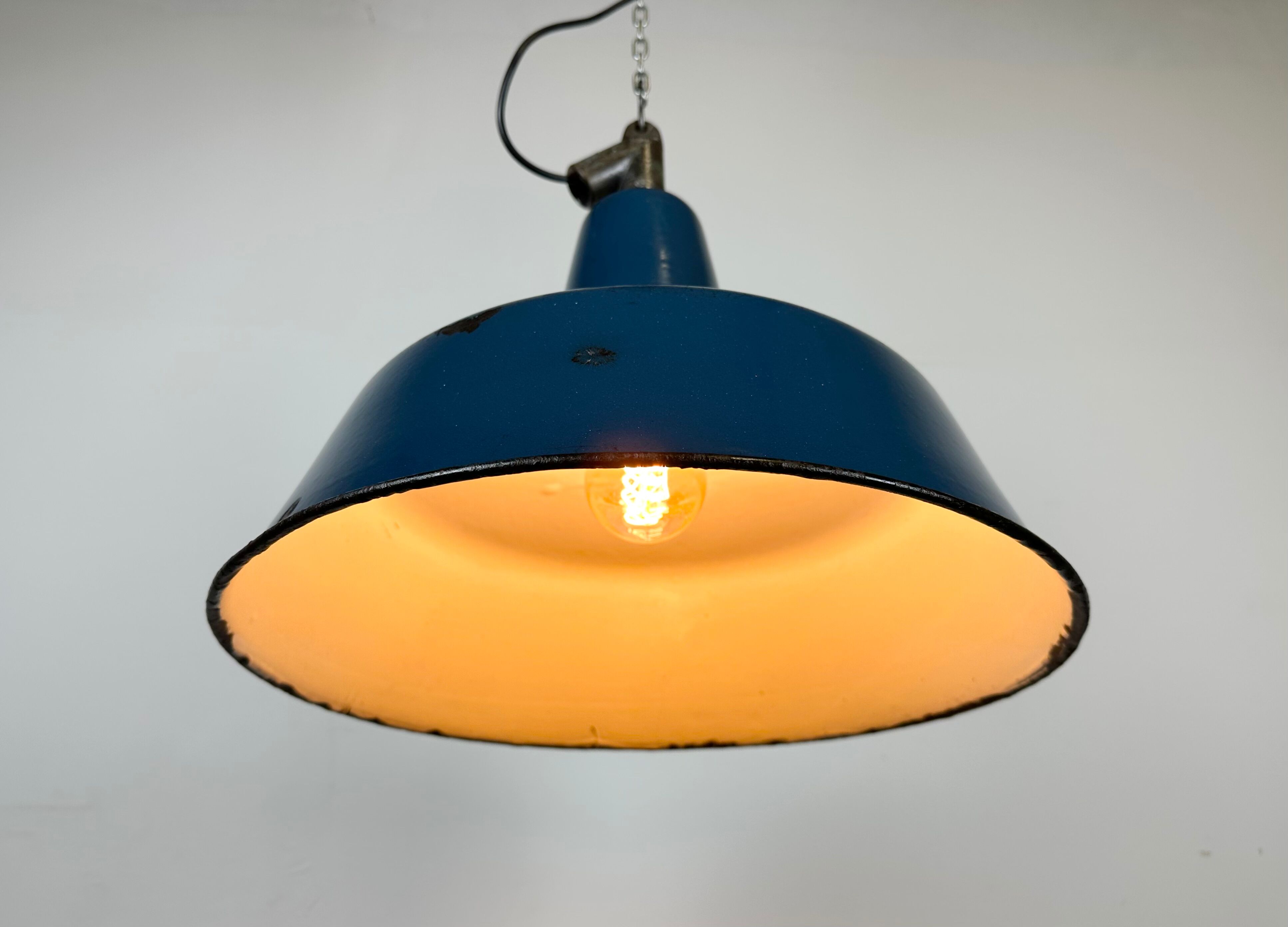 Industrial blue enamel factory lamp with cast iron top, 1960s