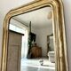 Louis-Philippe antique mirror with silver leaf, 19th century.
