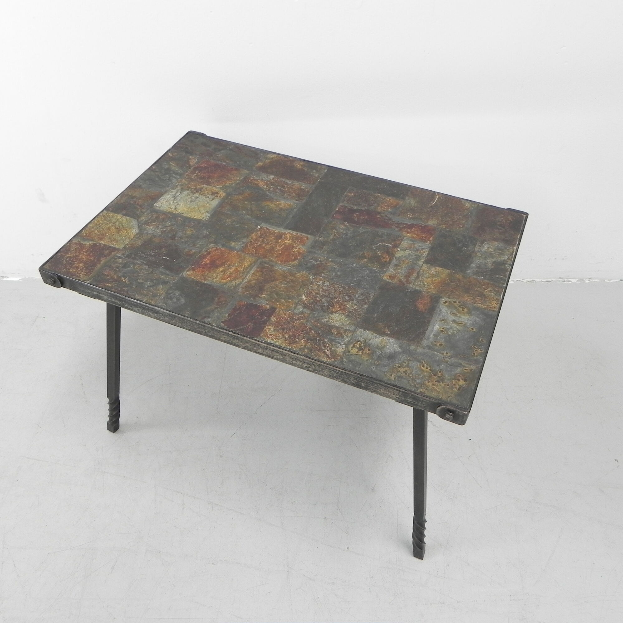 Brutalist coffee table with slate top