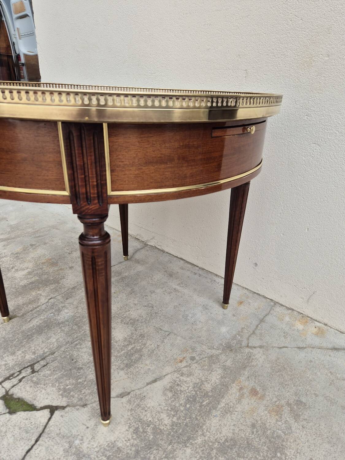 Louis XVI style mahogany bouillotte table in marquetry and bronze