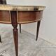Louis XVI style mahogany bouillotte table in marquetry and bronze