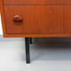 Vintage Scandinavian style chest of drawers in teak and black metal from the 60s
