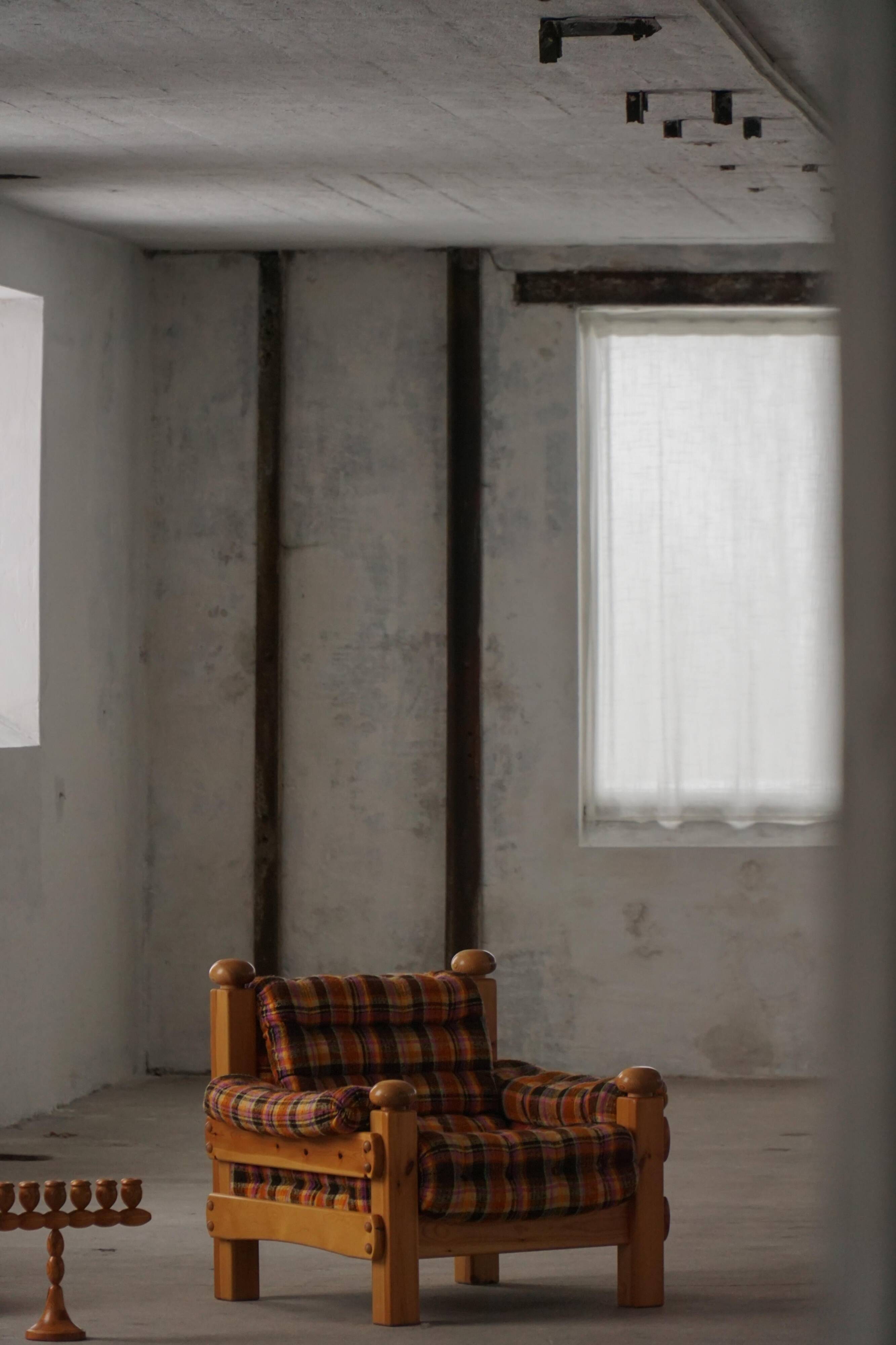 Brutalist lounge chair in solid pine, Swedish modern, made in the 1970s.