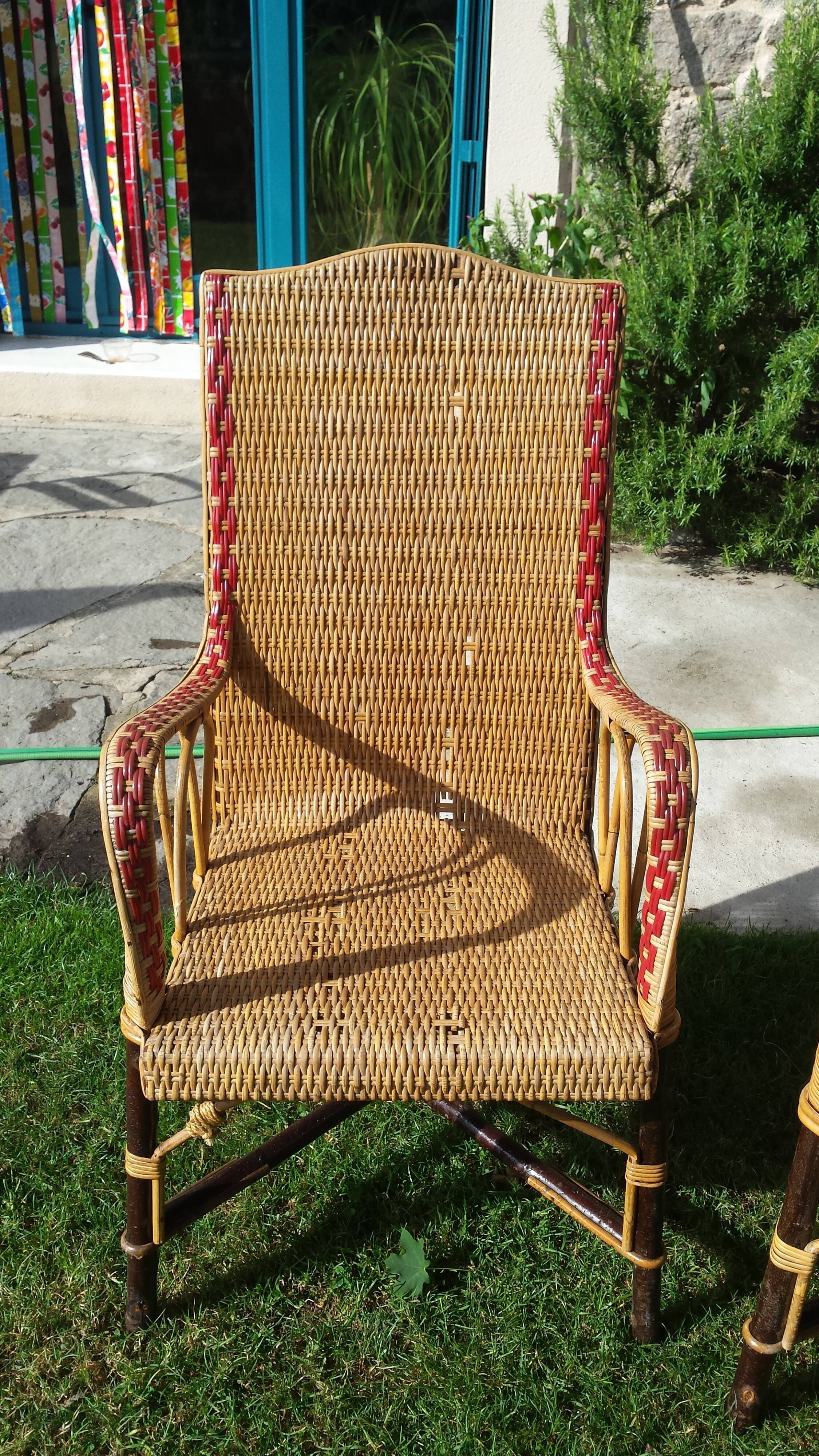 Wicker or rattan armchairs and bamboo