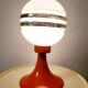 Lampe de table en métal orange et verre, vers 1960