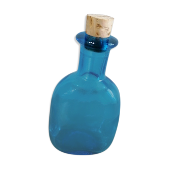 Blue bottle with cork
