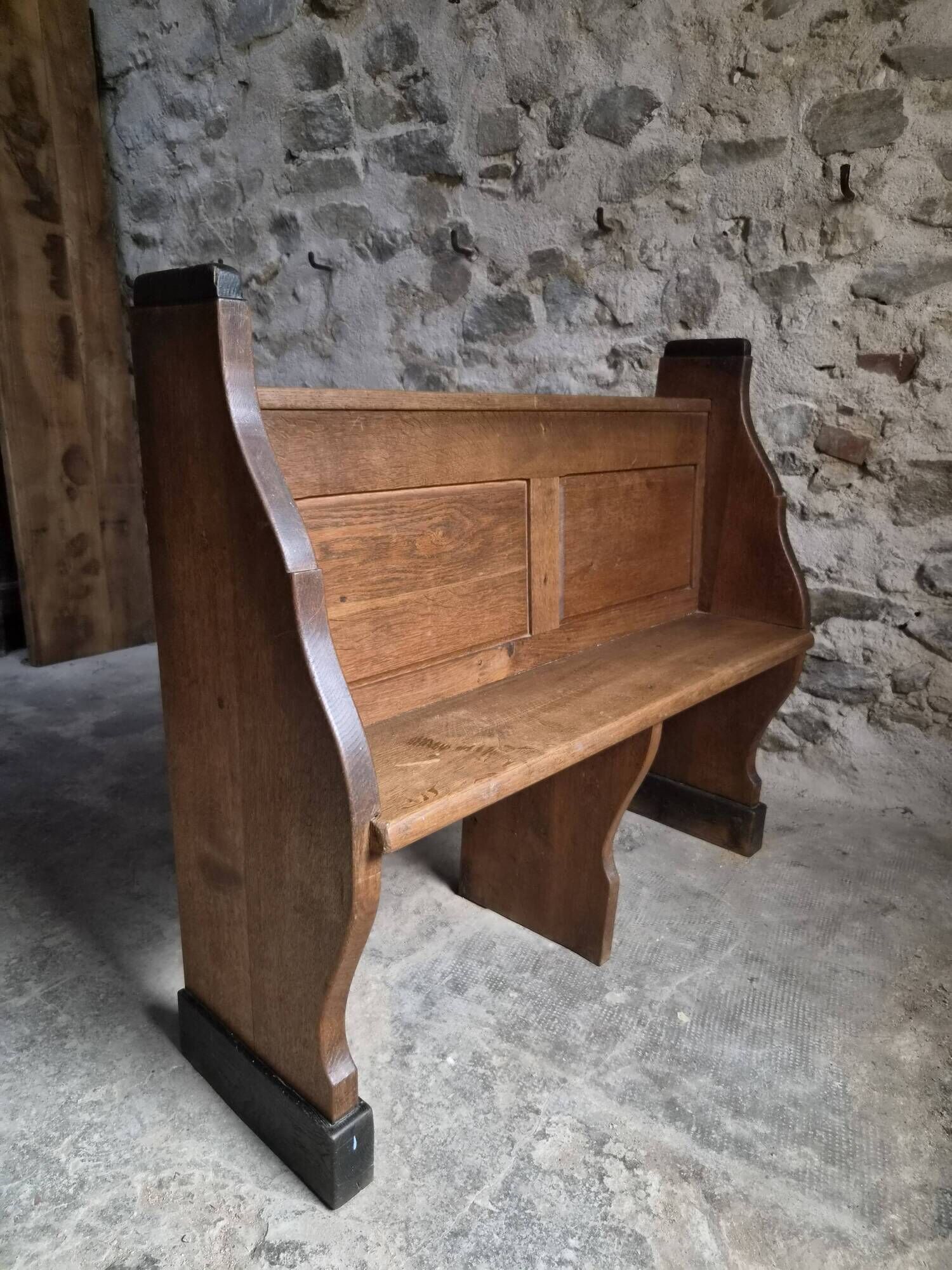Antique church bench in oak, circa 1900–1920