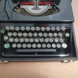Machine à écrire japy portable ancienne avec son coffre comme neuve