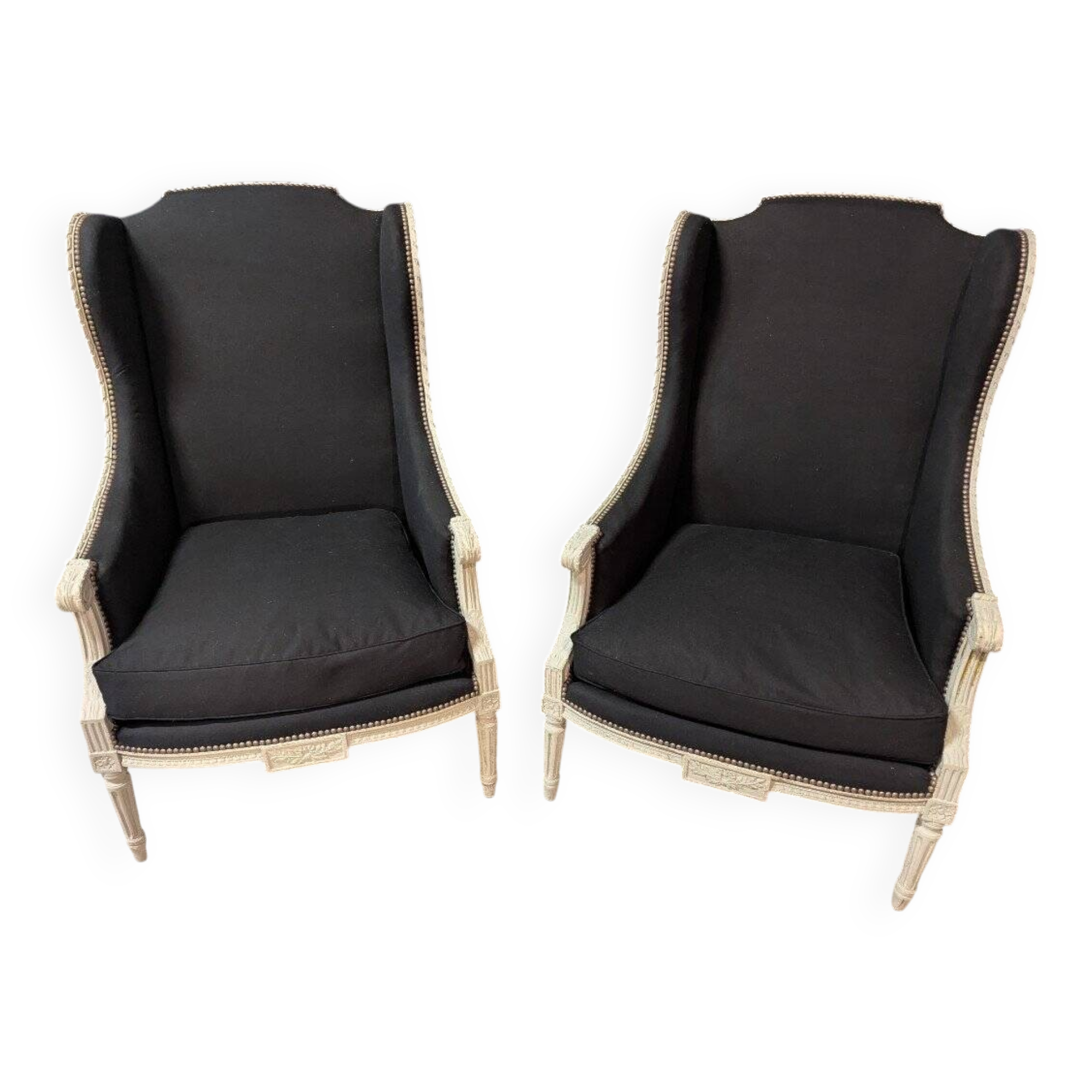 Pair of Louis XVI armchairs with ears in grey painted wood and black fabric.