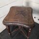 Tabouret ancien en bois sculpté en chêne massif