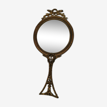 Mirror face to hand gilded bronze knot ribbon