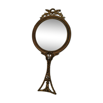 Mirror face to hand gilded bronze knot ribbon