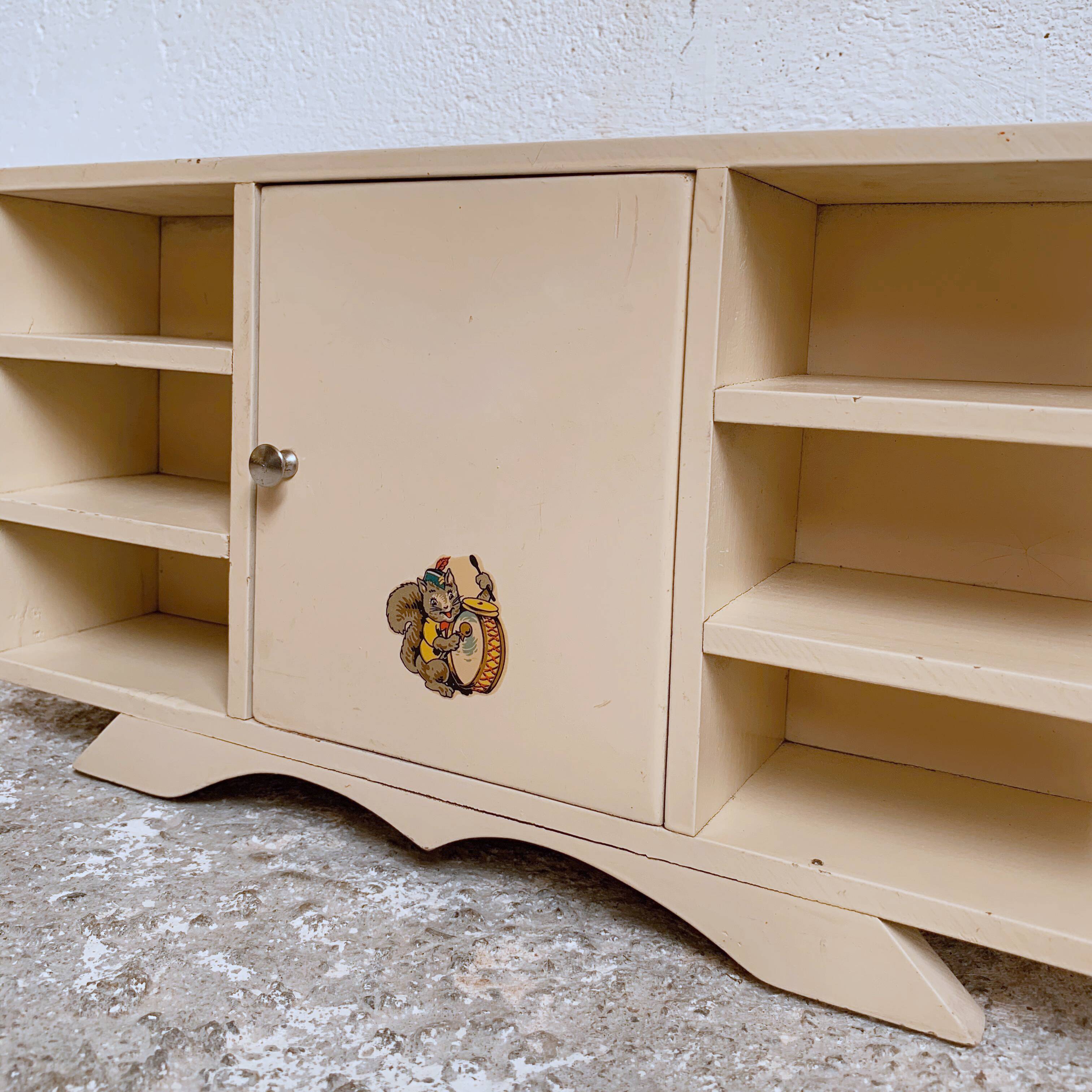 Old doll row wardrobe