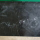 Bedside on black marble swan head