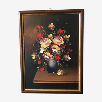 Painting flowers on brown background and golden frame
