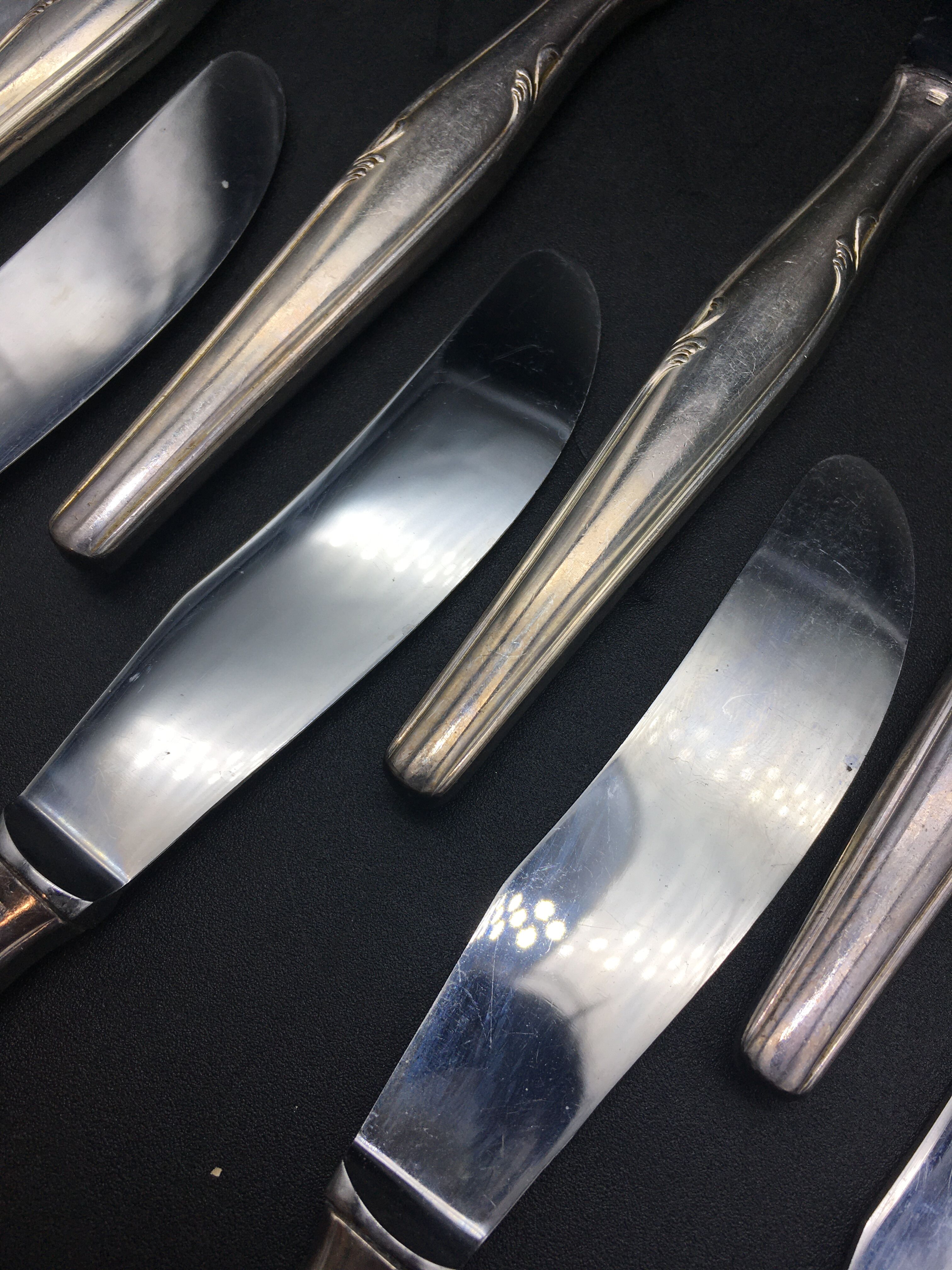 12 silver metal knives