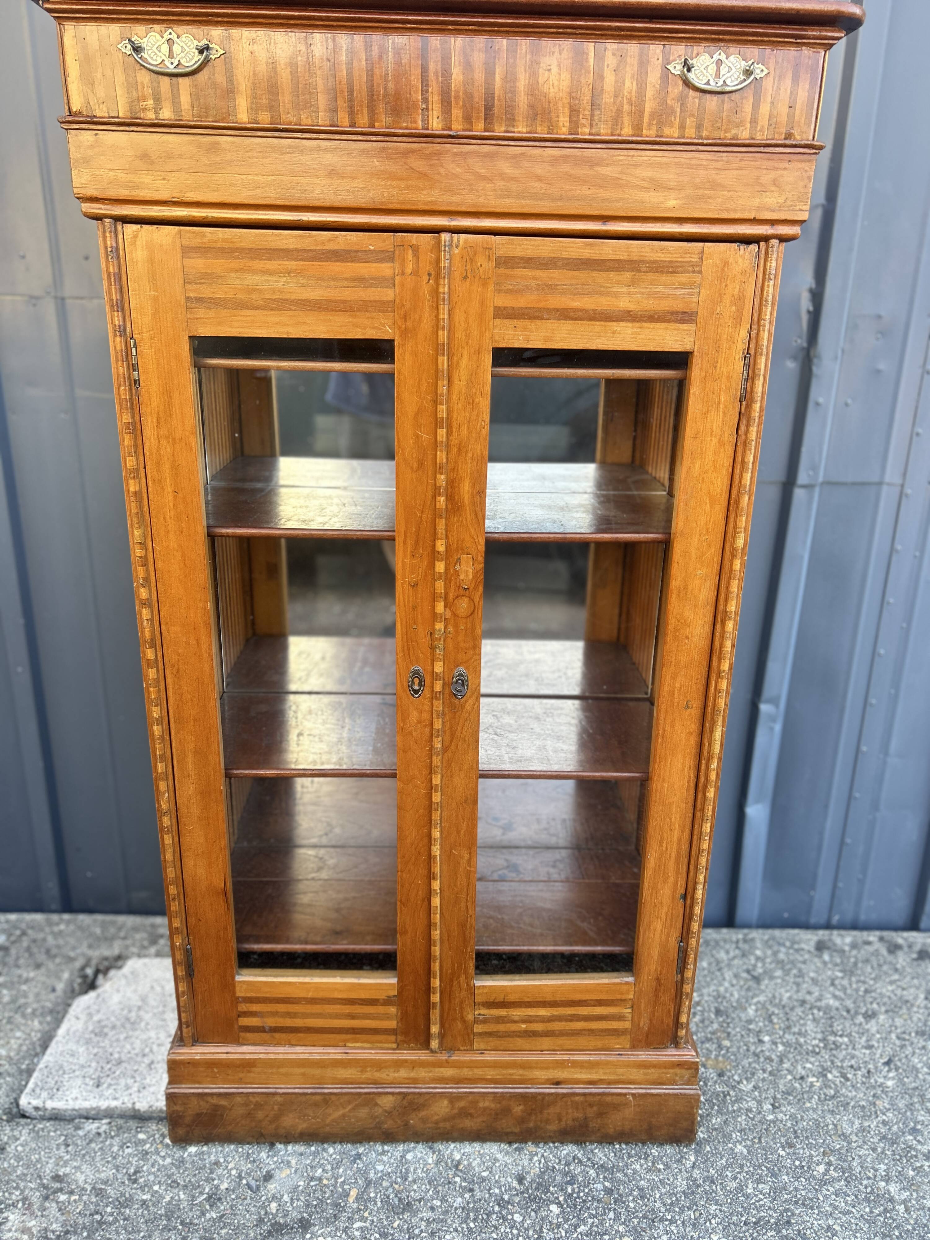 Two-door mahogany display cabinet