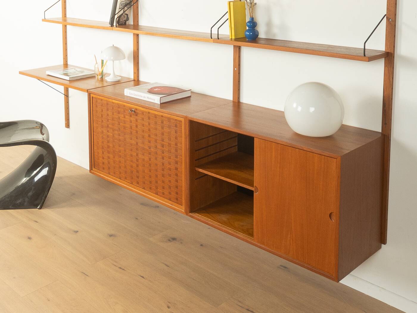 Classic shelving system from the 1950s in teak veneer by Poul Cadovius for Cado