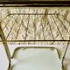 Glass and brass side table with magazine rack, circa 1970's