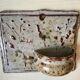 Enamelled sandstone wall flower pot