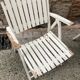 Five wooden garden armchairs