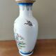 Vintage ceramic vase with Asian decor.