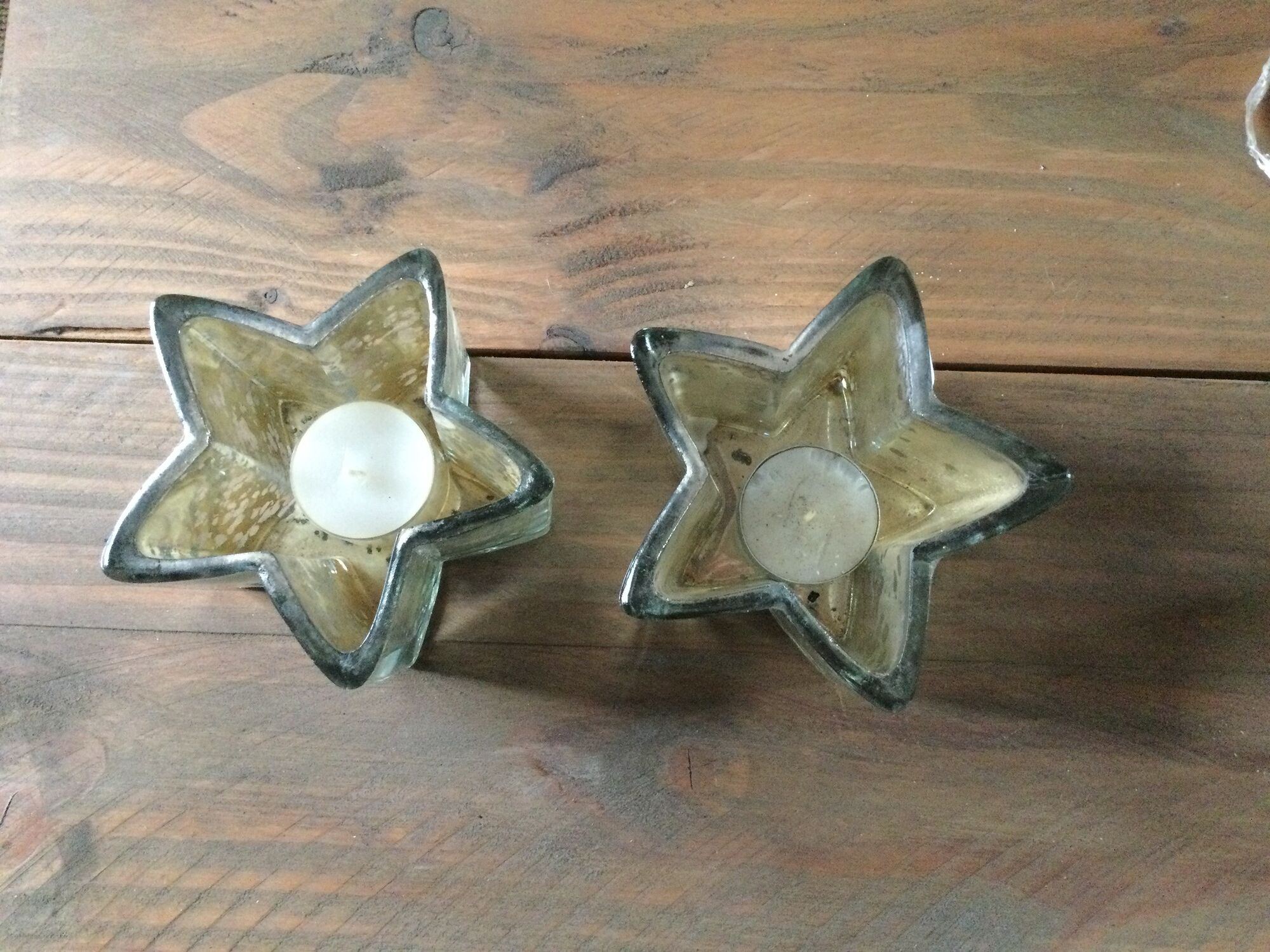 Pair of mercurized glass candle holders in the shape of stars