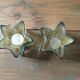 Pair of mercurized glass candle holders in the shape of stars
