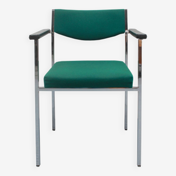 1970s chair in green with armrests