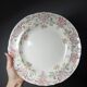 Antique Longchamp service shallow dish with polychrome daisies, ironstone, 19th century.