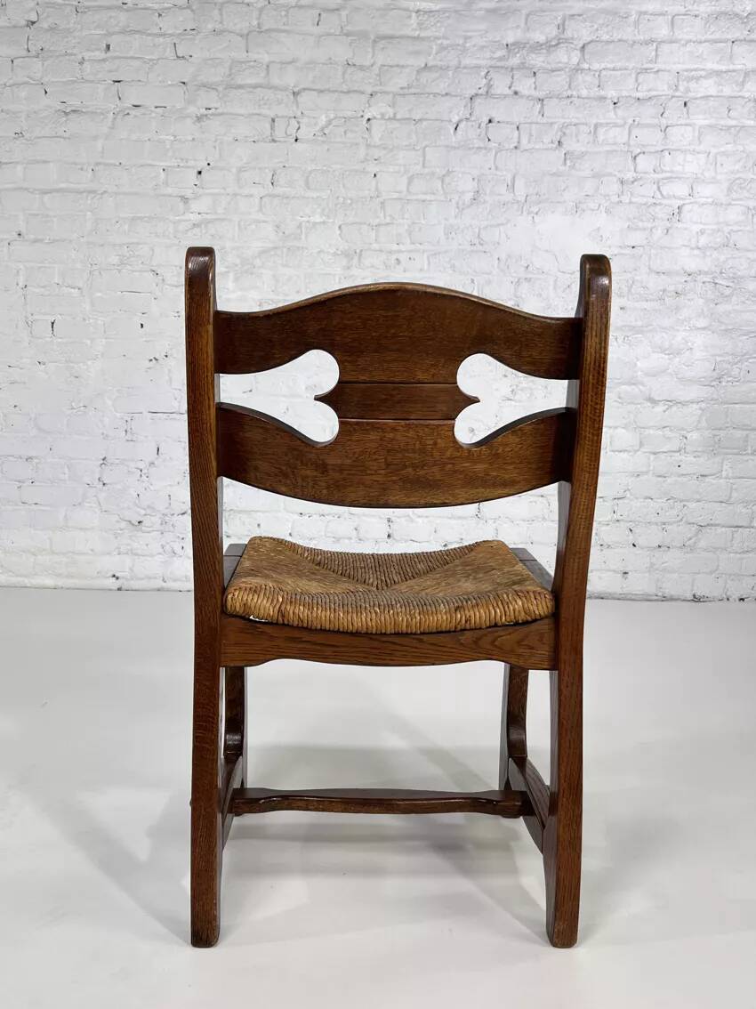 Set of 4 1950s chairs in oak with woven seats.
