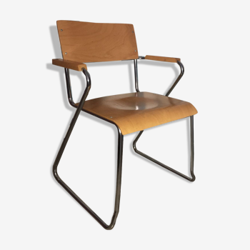 Modernist armchair with armrests