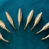 8 silver-colored metal goose-shaped knife holders