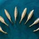 8 silver-colored metal goose-shaped knife holders
