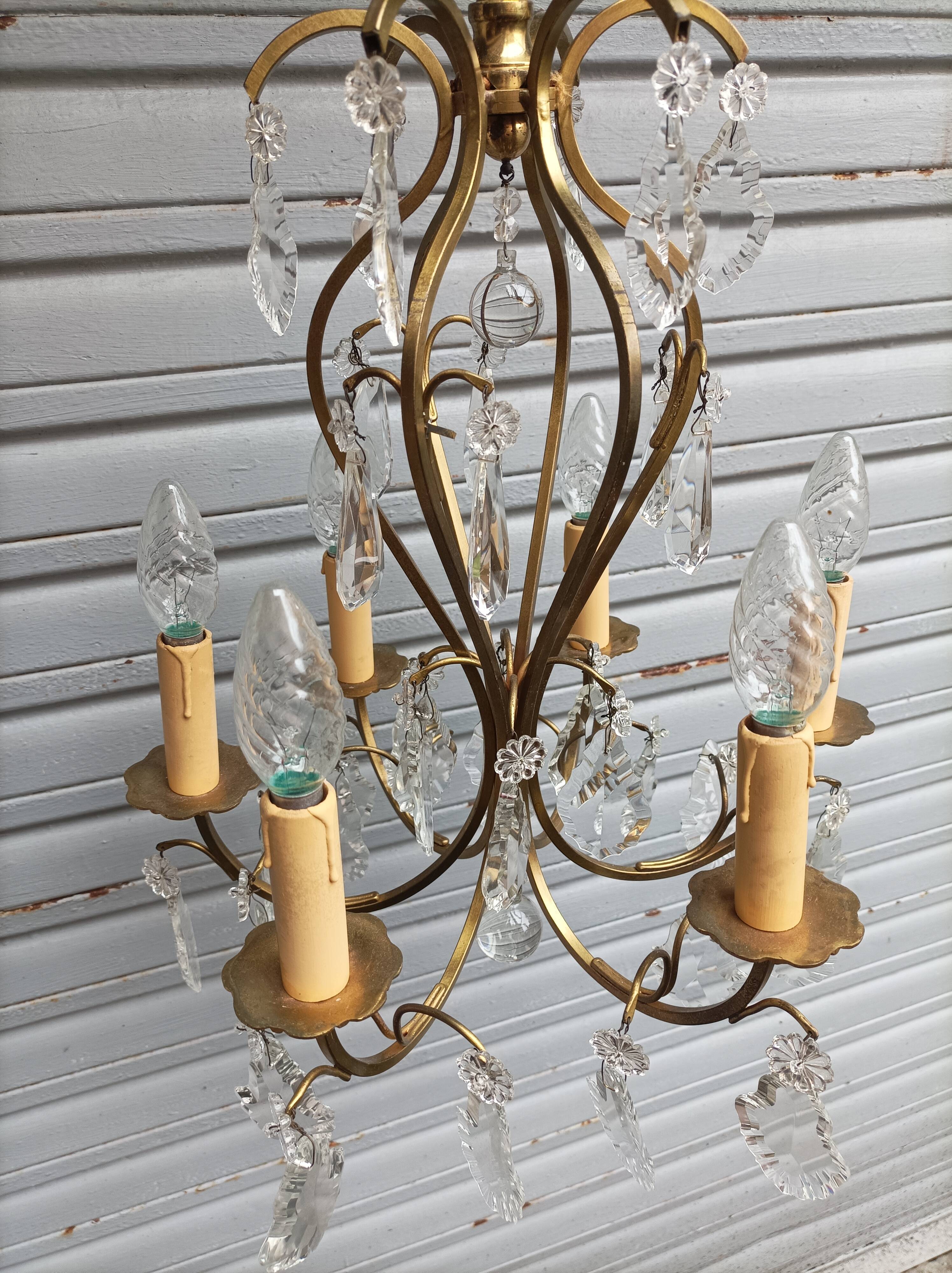 Remarkable 6-light cage chandelier with crystal pendants, complete and in working order.