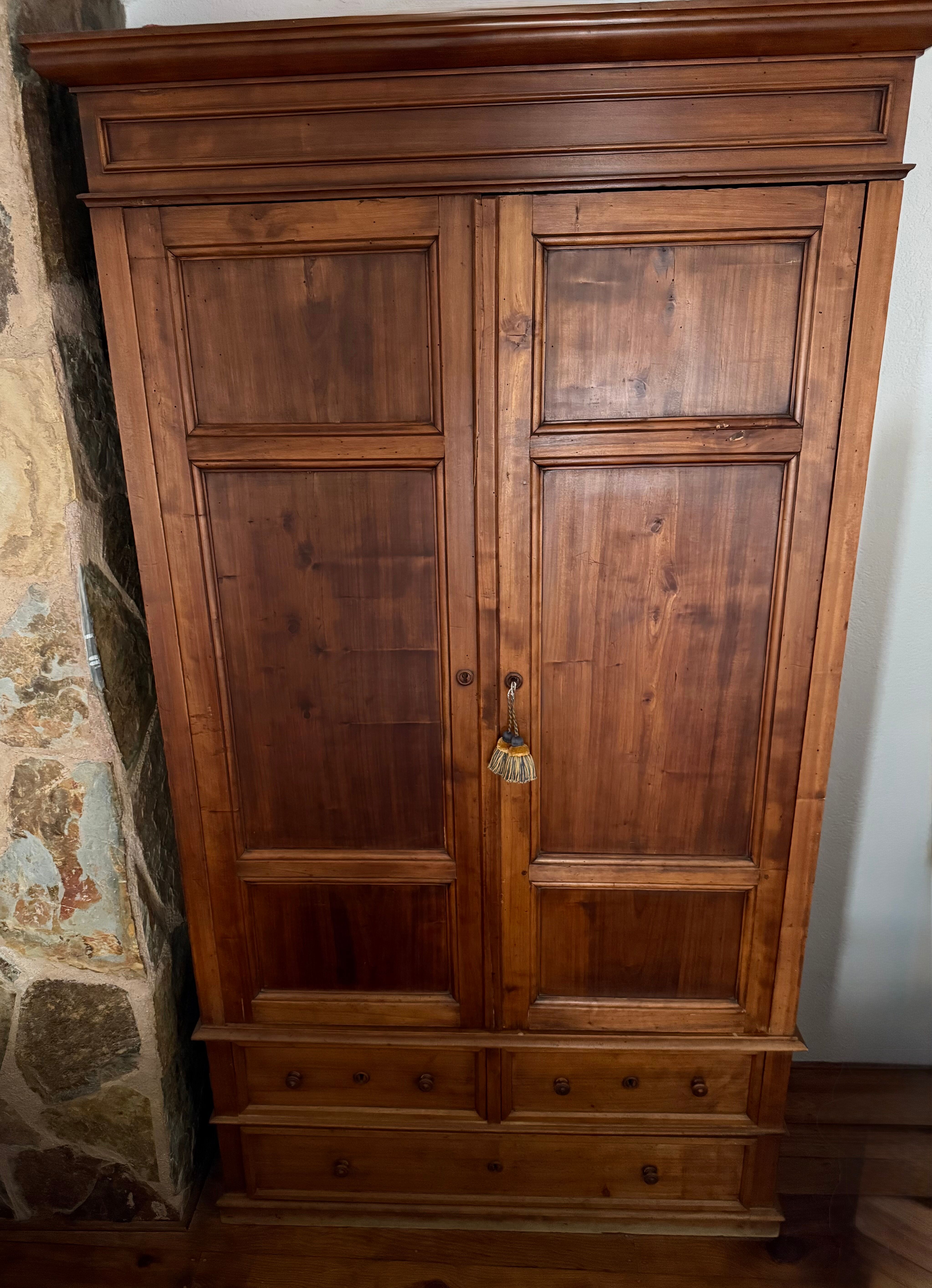 Antique solid wood wardrobe, rustic, with drawers and original key.