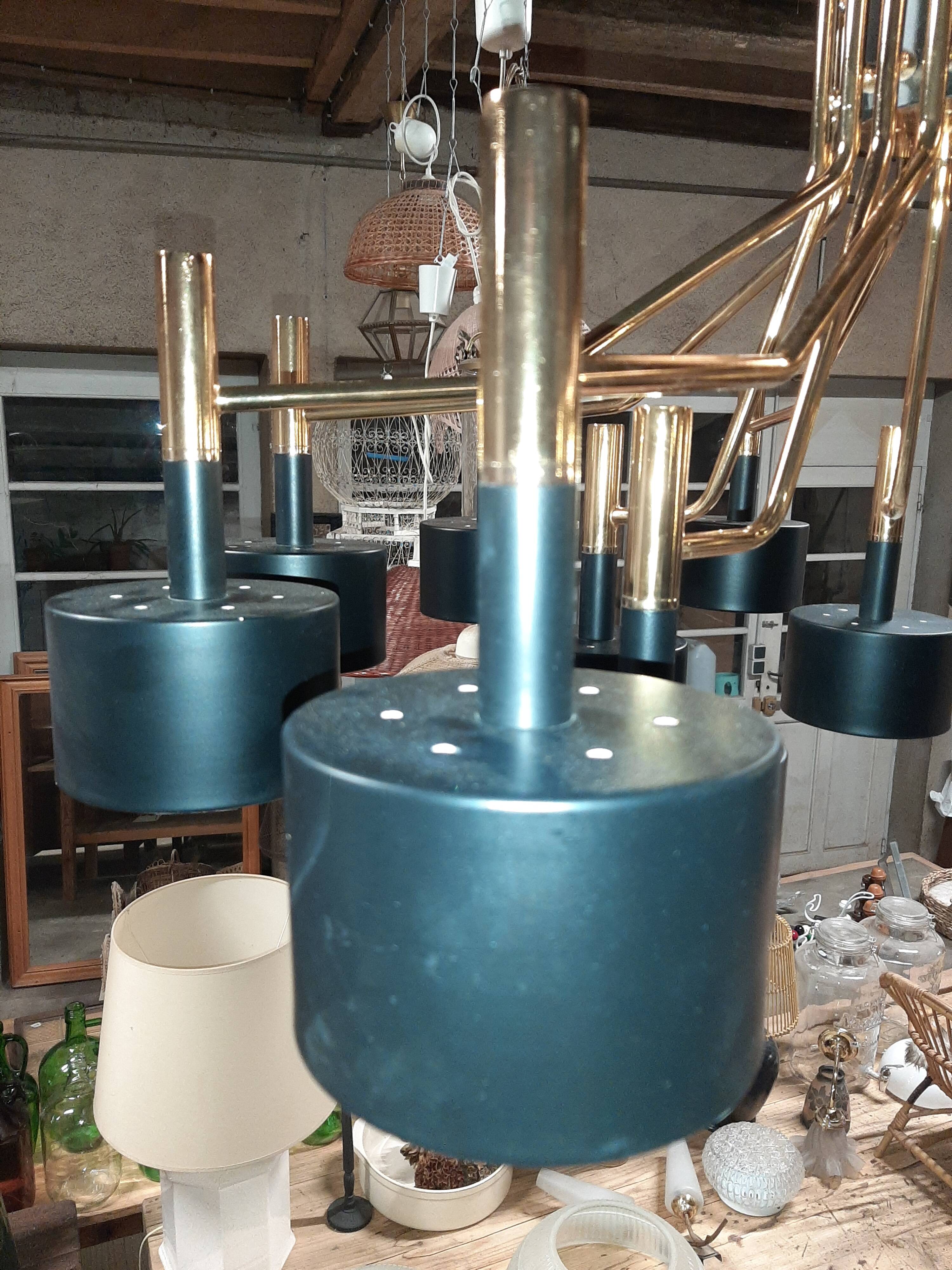 Black chandelier and gilded metal